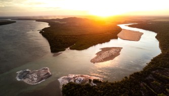 Aerial, Rio Tomo meets the Orinoco by sunset, river mouth, Vicha